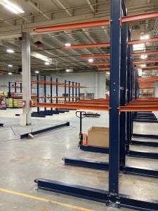 Cantilever rack system storing long flat panels and sheet building materials