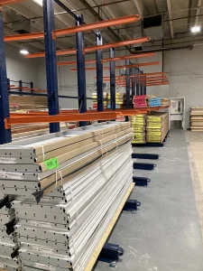 Double-sided cantilever rack system being installed in warehouse facility